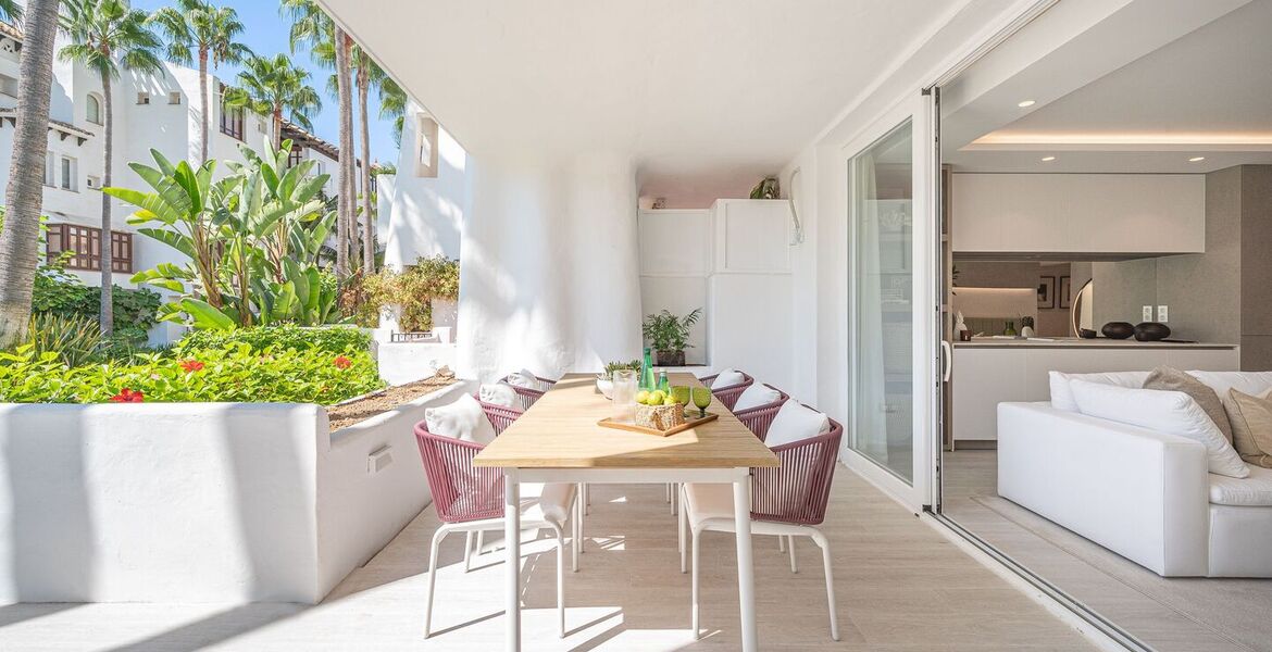 Un elegante apartamento de tres dormitorios en la planta baj